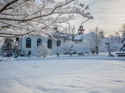 College Hall and nearby campus area in snow.